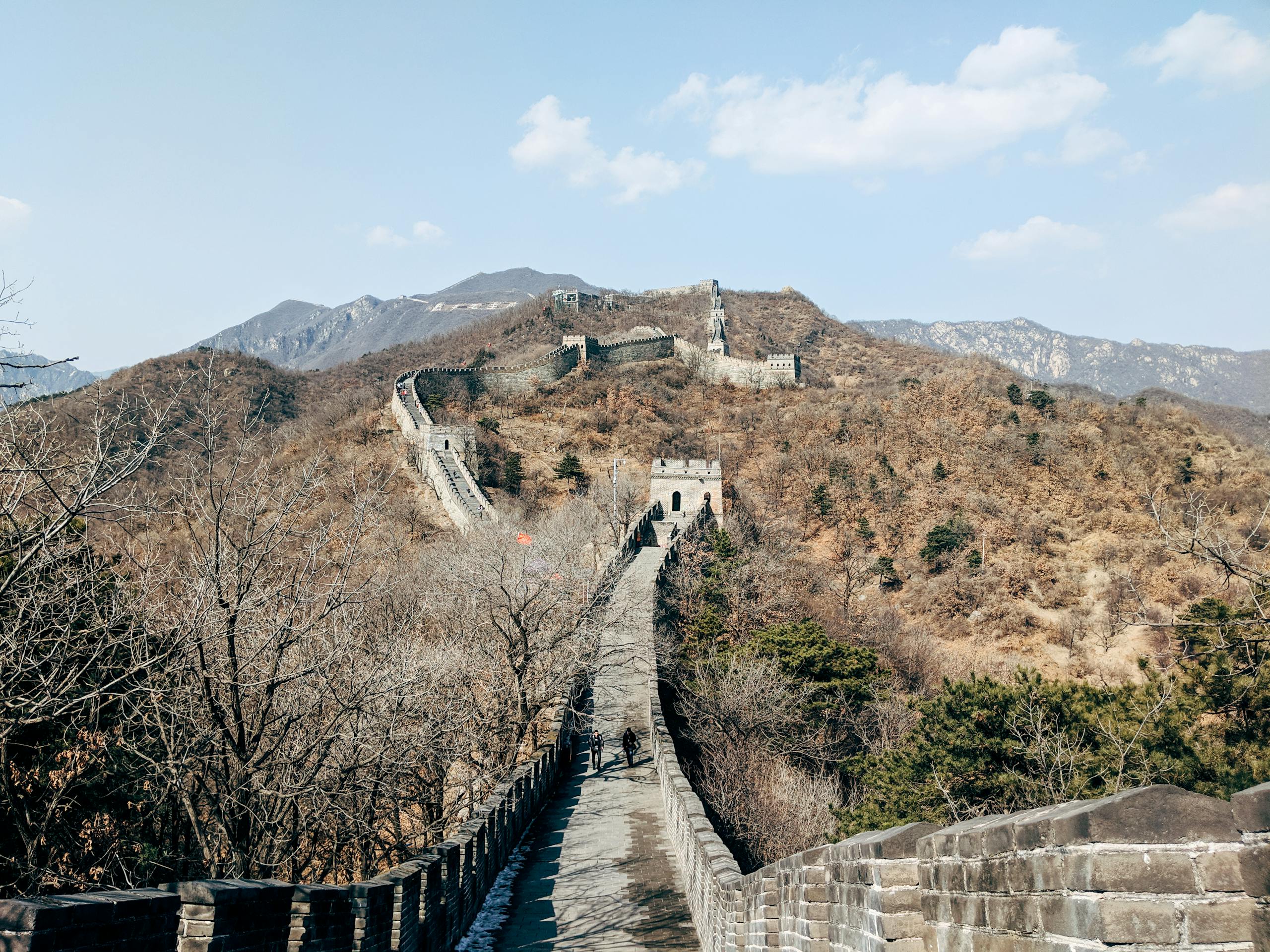Scenic view of the Great Wall of China winding through the mountains near Beijing in autumn.